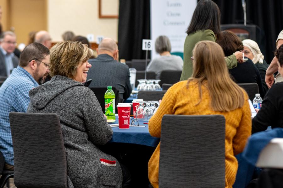 people at a table at the annual conference
